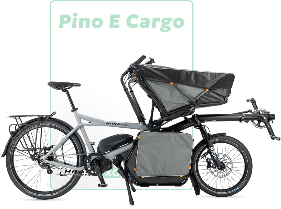 Das Tandem Pino Cargo von Hase Bikes, orange lackiert mit Shimano EP8 E-Antrieb und Tasche vorne